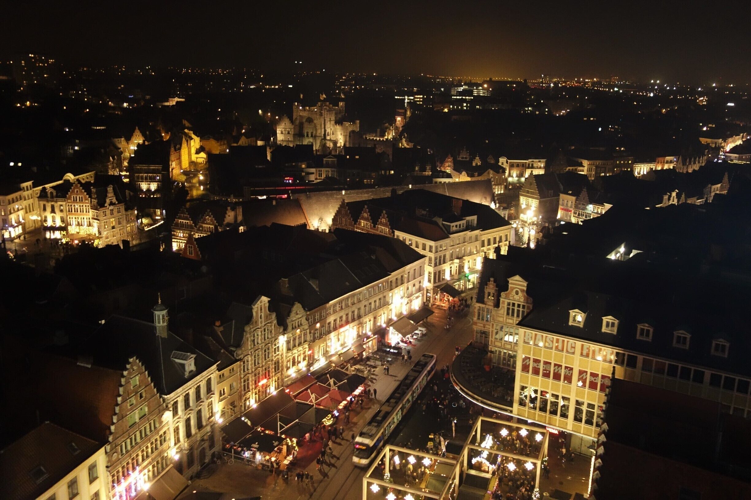 View of the historical centre (December). Wherever you look, you will see buildings and monuments with a story to tell. A 1,000-year-old castle (on the background), medieval towers and the most beautiful double row of houses in Europe, on each side of the river (on one side houses from the late 12th – 15th century), all within walking distance from one another. #Ghent  #TroveOnTuesday  €Perspectives