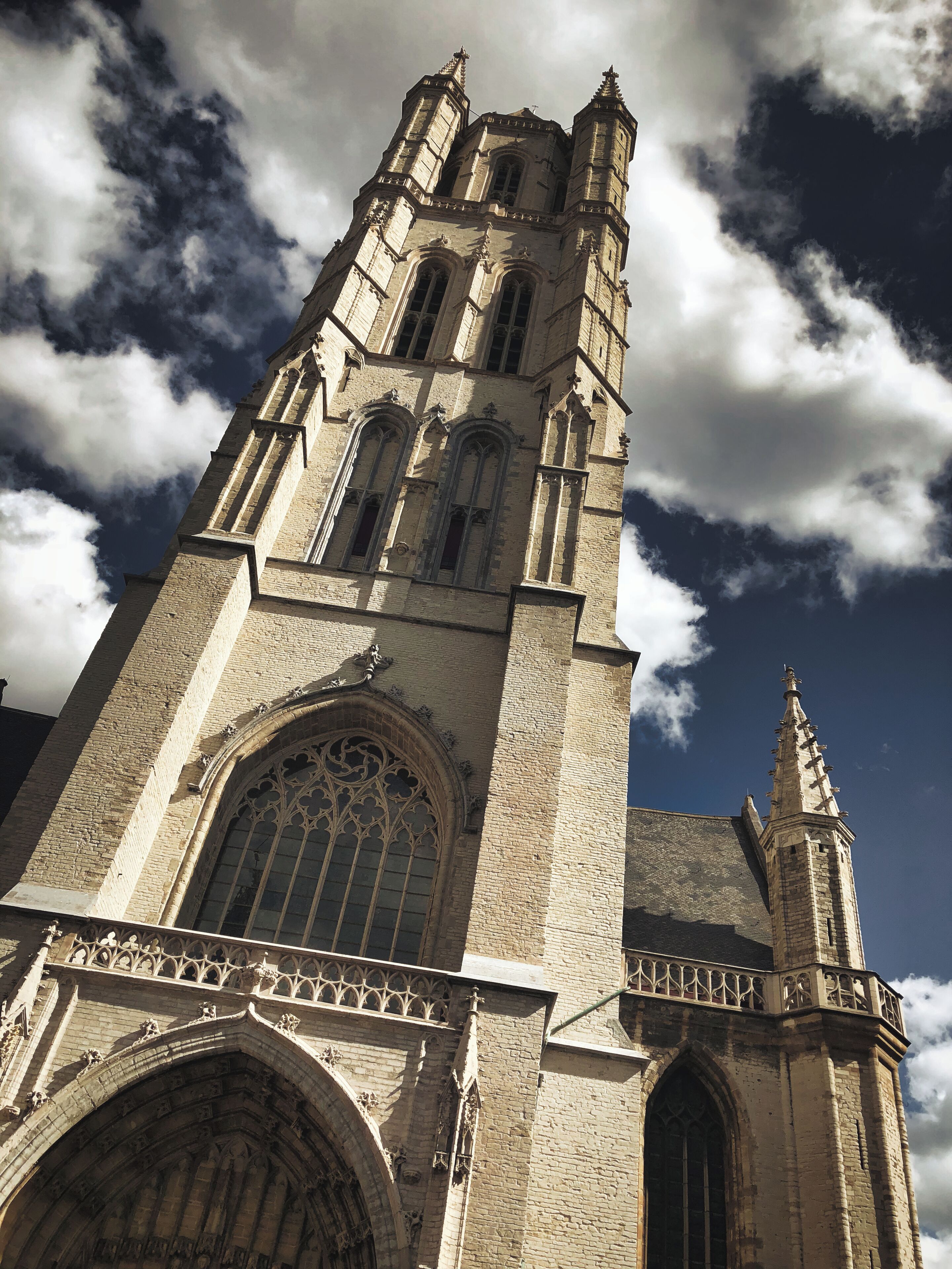 Inside this exquisite cathedral is the famous altar piece of Ghent, "The Adoration of the Mystic Lamb". There is a fee to see the altar piece and there will be a lineup to enter so be prepared to wait. 
If you do not plan on seeing the famous altar, there are many other pieces of incredible art inside including a painting by Peter Paul Rubens, a famous, influential Flemish artist.