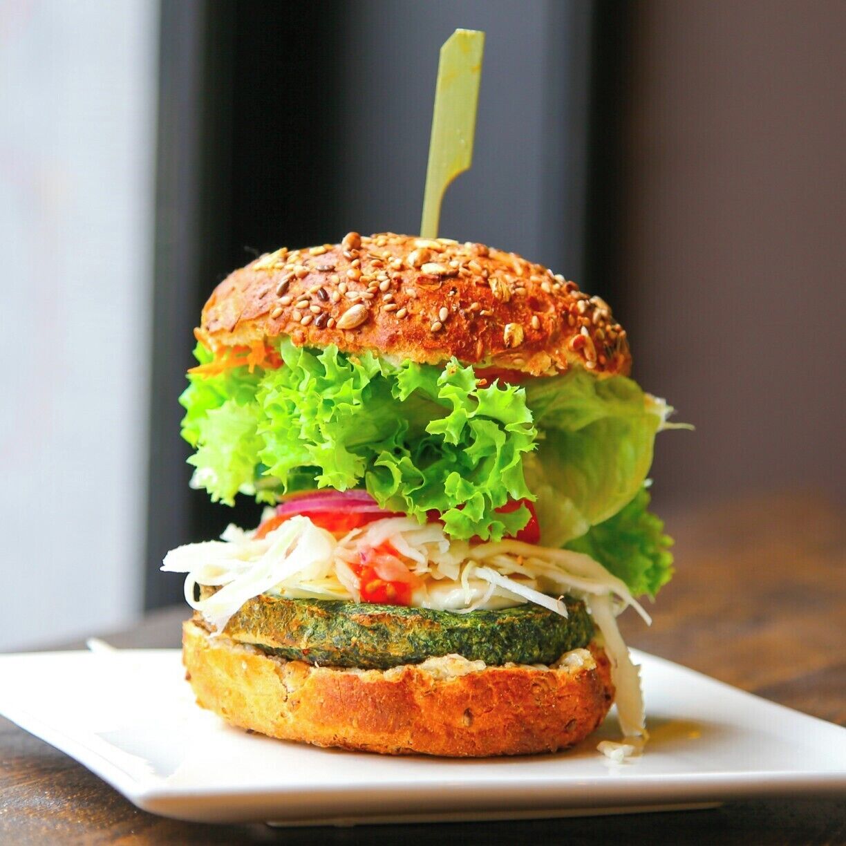 This vegan, organic spinach burger from Greenway in Ghent, Belgium was loaded with cabbage, beets and greens. What made it really hit the spot was the fresh, seeded bun from a local Ghent bakery. #delicious