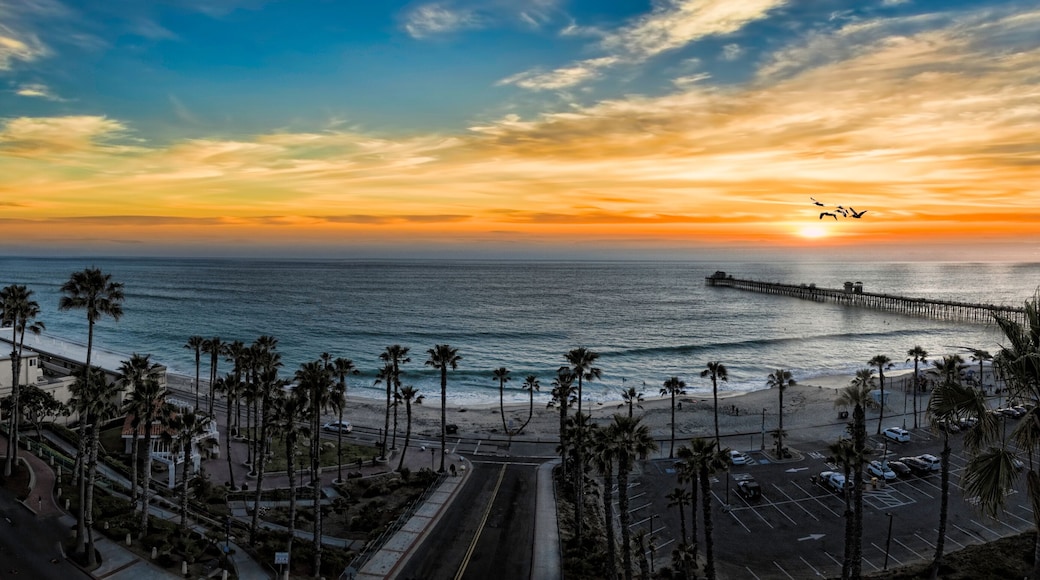 This is a colorful three image aerial sunset panoramic of Oceanside, California, USA. Oceanside is 40 miles North of San Diego, California.