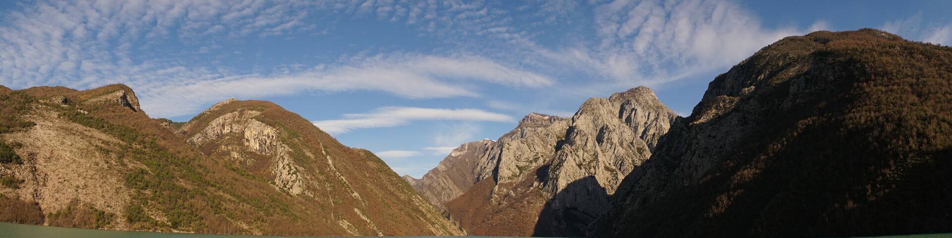 Lake Koman gorge and mountain landscape in Albania.