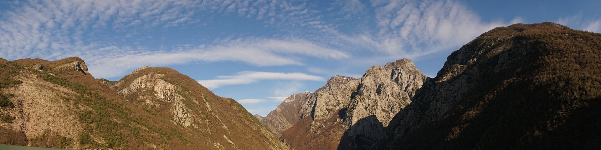 Lake Koman gorge and mountain landscape in Albania.