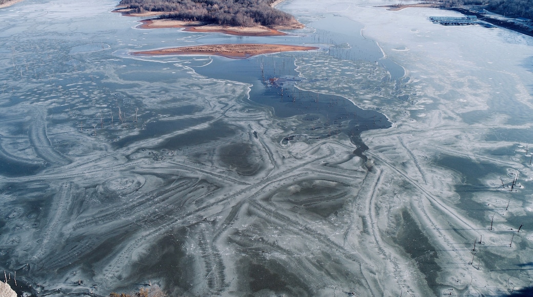 Truman Lake just east of Clinton, Missouri. After a week of freezing weather, this man made lake was just beginning to thaw around the thousands of tree trunks that threaten the hulls of fishing boats