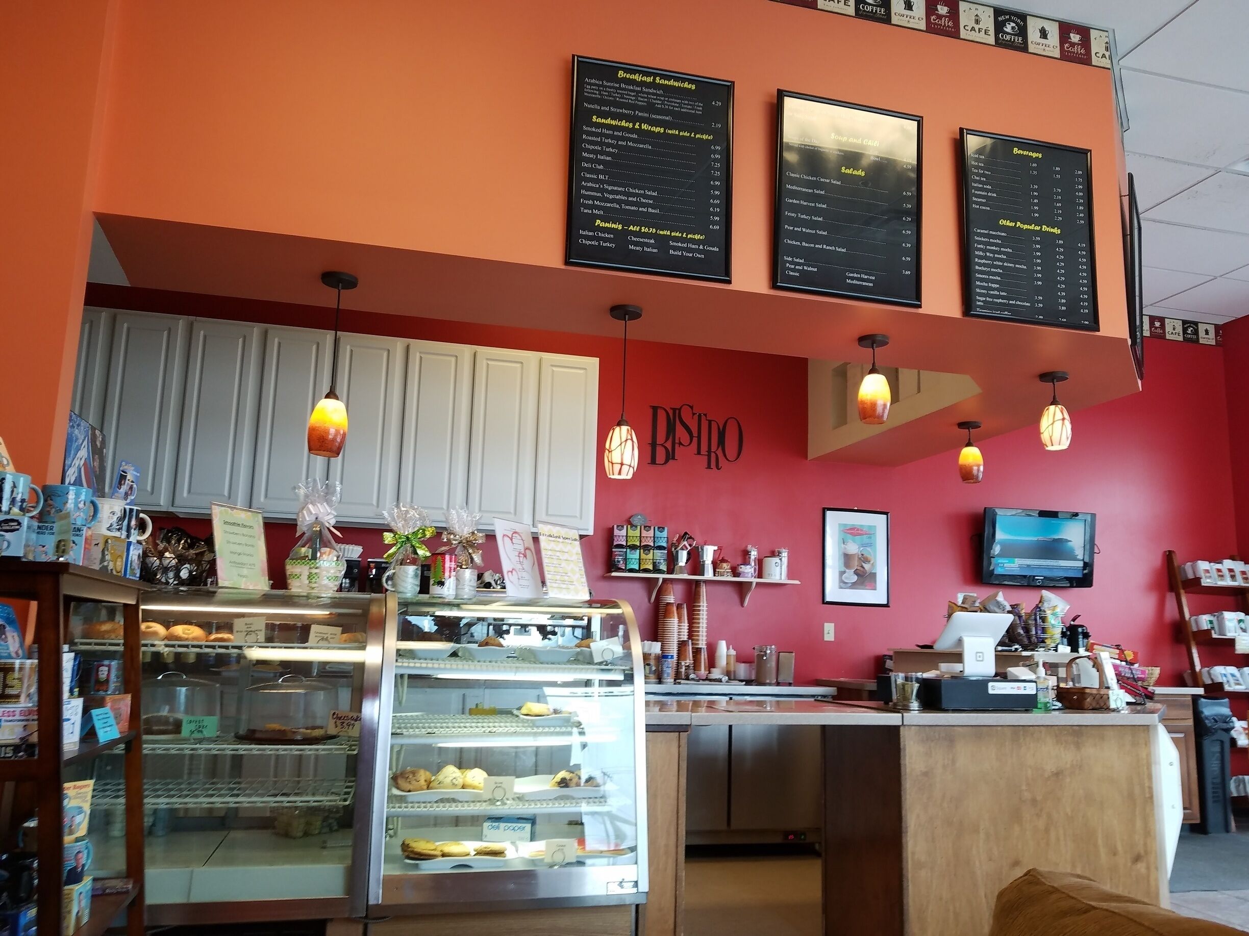 Nice cafe for  a quiet hot or cold drink. My favorite is a Chai Latte. Scones, bagels, muffins and other fare available. Seating options available: one couch and chair with a foot stool next to a fireplace, one chair and foot stool in far back corner, two topper tables, and booths.