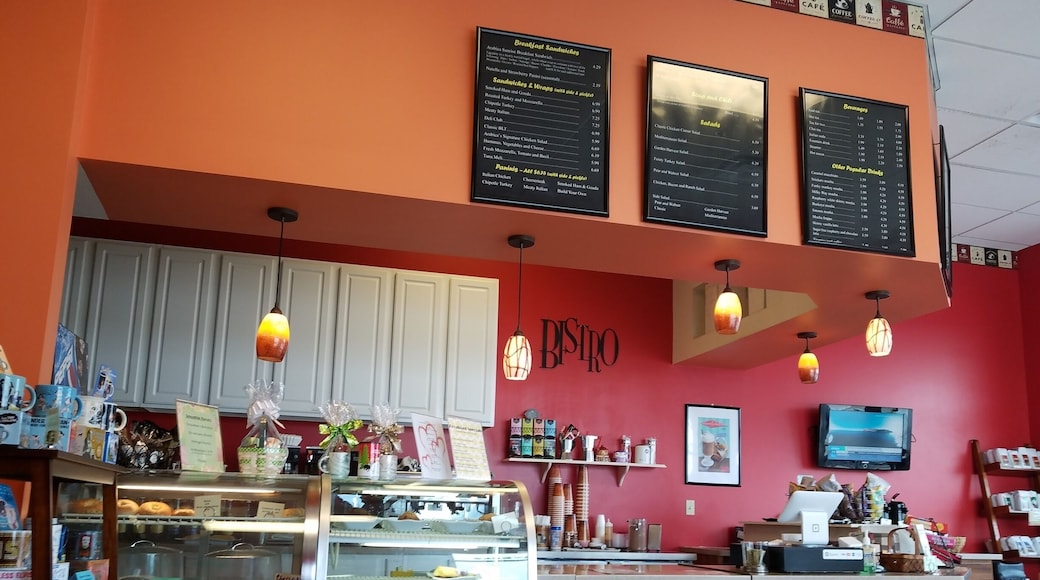 Nice cafe for a quiet hot or cold drink. My favorite is a Chai Latte. Scones, bagels, muffins and other fare available. Seating options available: one couch and chair with a foot stool next to a fireplace, one chair and foot stool in far back corner, two topper tables, and booths.