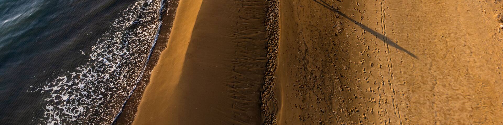 Me strolling on the wild Alberese beach in the evening with low tide