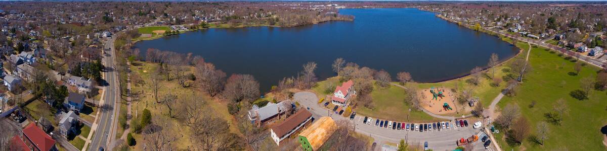 Wakefield Lake Quannapowitt panoramic aerial view in historic town center of Wakefield, Massachusetts MA, USA.