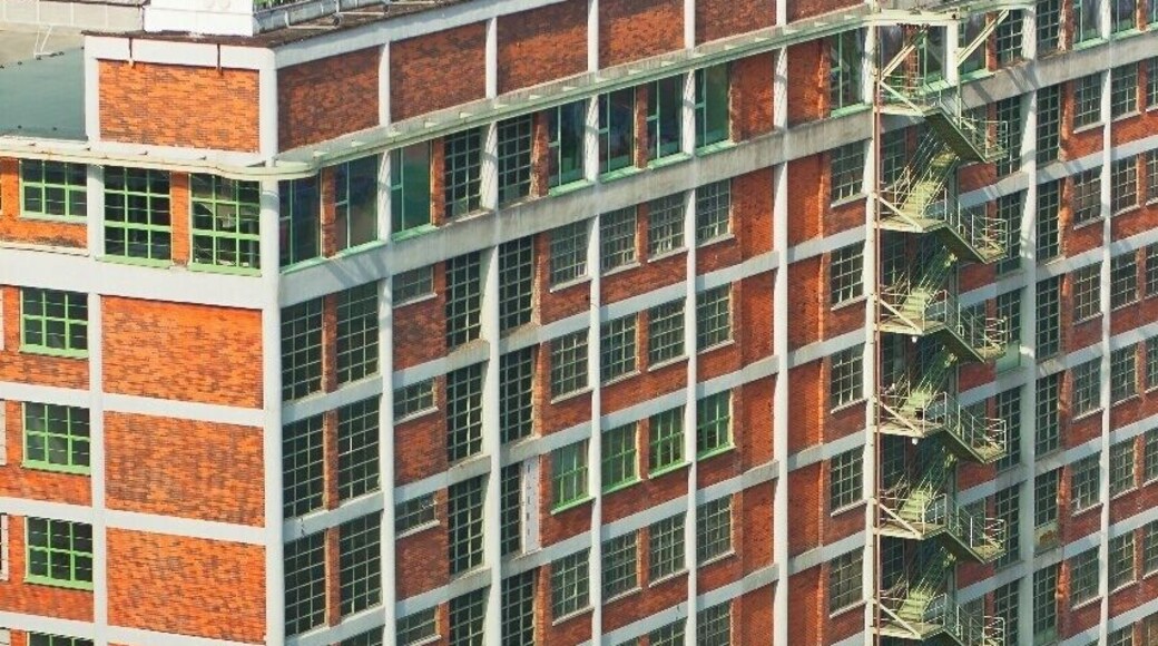 March 2016
Building Nr. 34, Zlín, Czech republic
Tomáš Baťa was born 140 years ago and after WWI he succesfully founded a shoe making business and he became the biggest shoe manufacturer and shoe retail seller in the world before WWII with some 35 thousand employees worldwide.
In Czech republic he actually reformatted the town of Zlín in South Moravia. In 1926 Baťa invited many architects (eg. Le Corbusier) and built a whole new aglomeration in Functionalism style. Not only the manufacturing halls, but also offices, shopping mall, hospital, cinema hall, hotel and houses for his employees.
Most of the new architecture was built before WWII, but some buildings added later actually respected the original vision seamlessly. One of them is the 10-storeyed central shoe storehouse, called Building Nr. 34 built in 1949-55 after the shoe factories were nationalized. With roughly 45 thousand square meters of space it is a real collossus. Ground floor was used for train transport, second for trucks. There was an oval rail on each storey and vertical movement was handled by elevators. On each side of the building there were outside fire escape stairs. As most of the buildings in Baťa's Zlín it had an steel and concrete sceleton made of 6x6 meters modules and raw bricks facade.