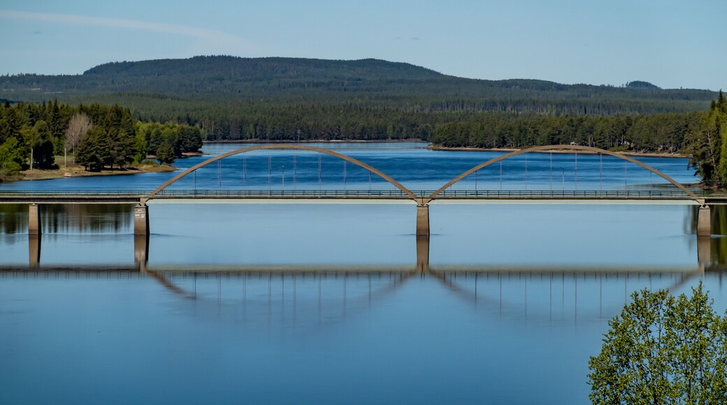 Vindeln, Sweden A steel car bridge crosses the Pitea River on a sunny day.