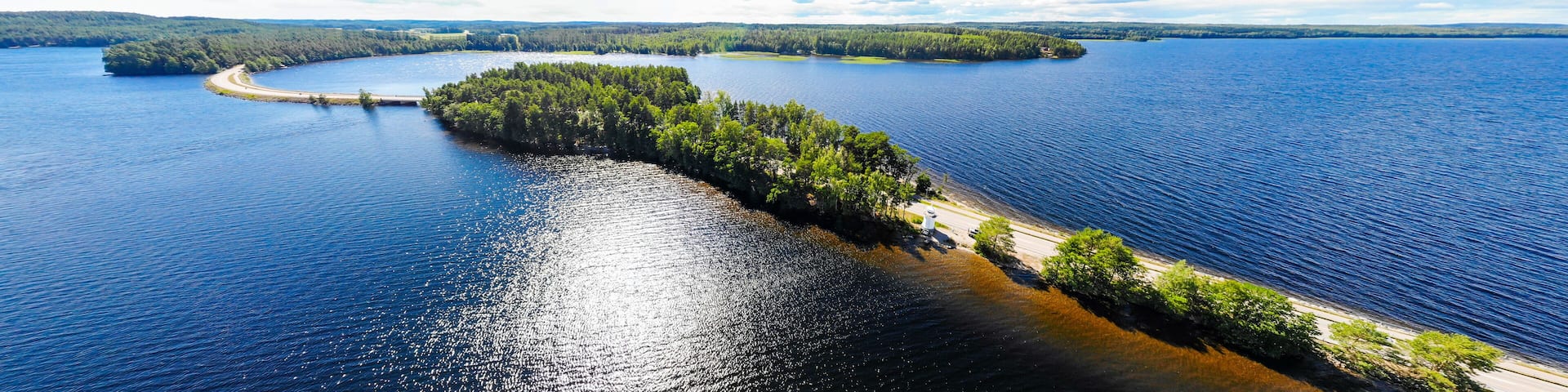 Aerial panoramic view of Pulkkilanharju Ridge on lake Paijanne, Paijanne National Park, Finland. Drone photography