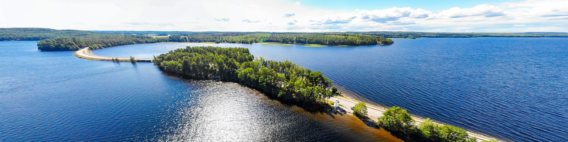 Aerial panoramic view of Pulkkilanharju Ridge on lake Paijanne, Paijanne National Park, Finland. Drone photography