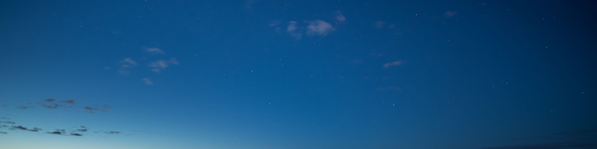 Blue night scenery over the frozen lake Näsijärvi in Tampere, Finland