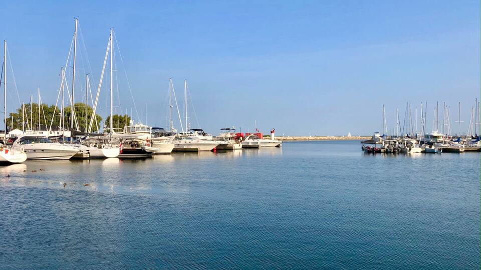 saiing boats in the harbor of cobourg ontario