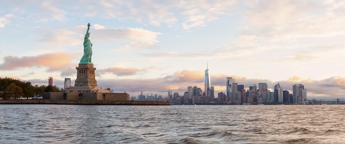 The Statue of Liberty and the New York City skyline.