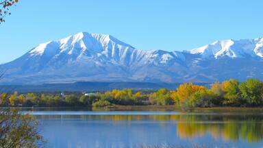 The Spanish Peaks are a pair of prominent mountains located in southwestern Huerfano County, Colorado. The Spanish Peaks were designated a National Natural Landmark in 1976.