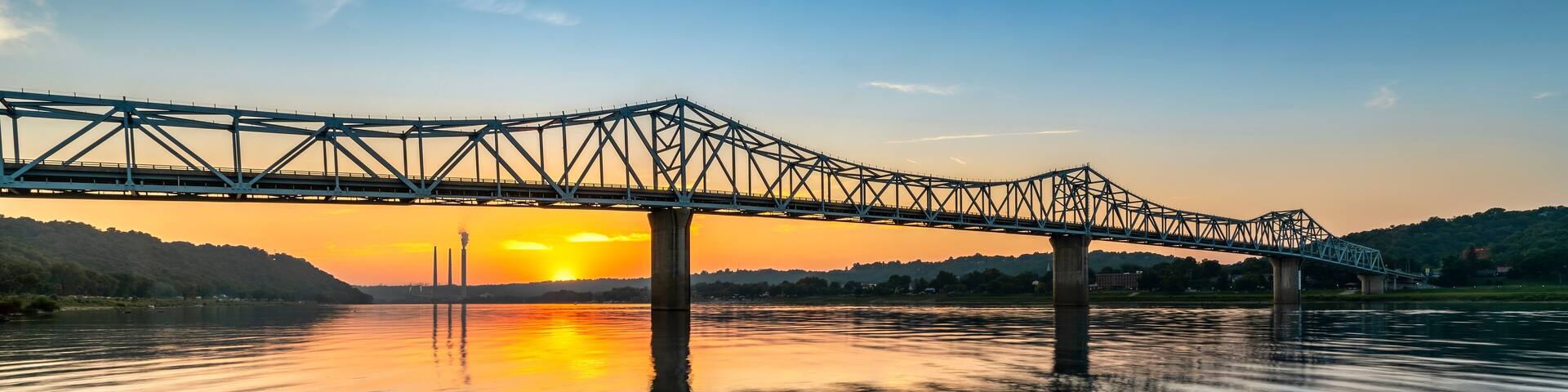 A small, beautiful waterfall splashes over a cliff and into a rocky forest canyon at McCormick’s Creek State Park, the first state park in Owen County, Indiana.