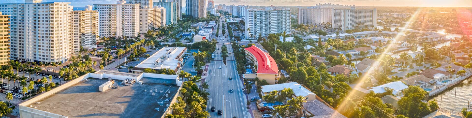 Panoramic aerial drone of city in Fort Lauderdale, Florida with sunset