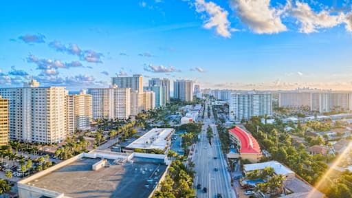 Panoramic aerial drone of city in Fort Lauderdale, Florida with sunset