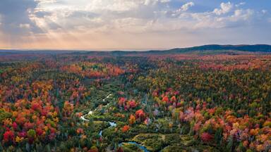Sunset autumn aerial views on the drive through the Michigan Upper Peninsula UP - Highway 41 M26 Aerial view