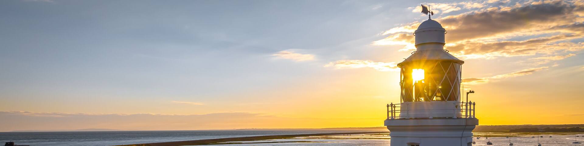 Sunset view of Hurst Point Lighthouse is located at Hurst Point in the English county of Hampshire