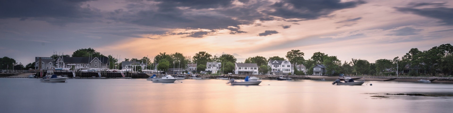 Nice beach, picnic tables.
Park done the street if you don't have the Darien sticker.