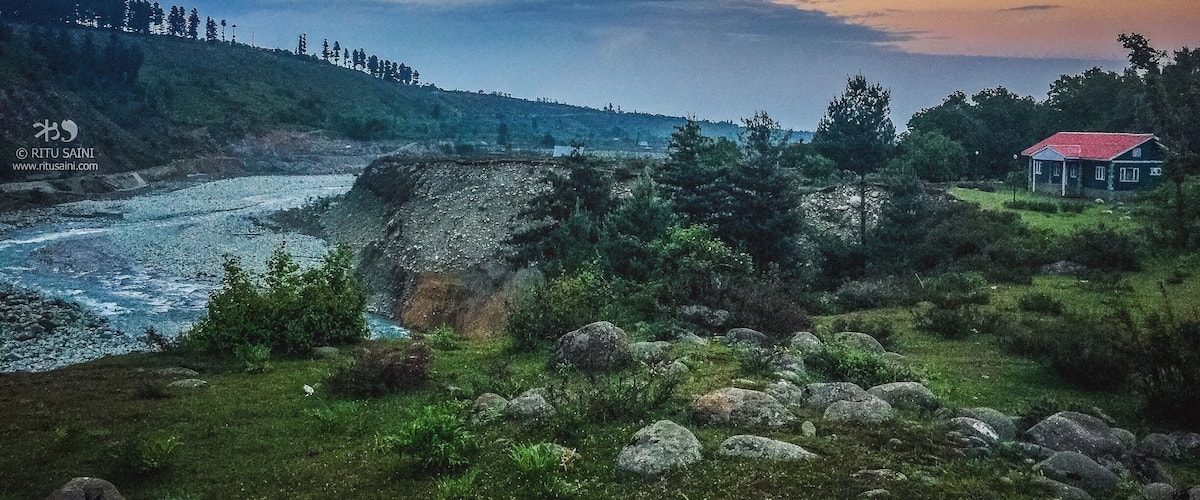 J&K tourism bungalow by the river at Aharbal in Kashmir near Shopian.