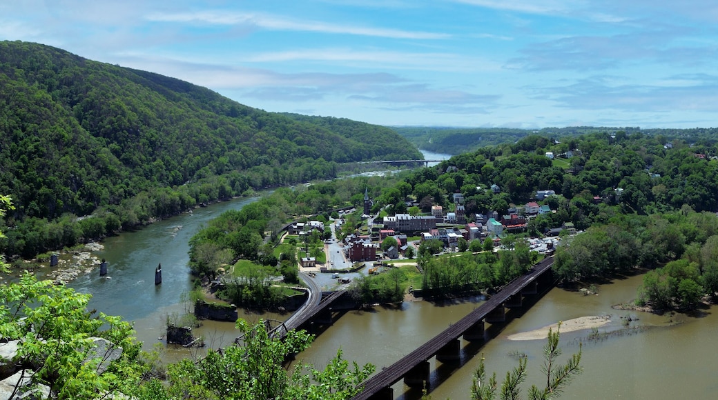 panoramic view of Harpers Ferry, West Virginia with river and mountains