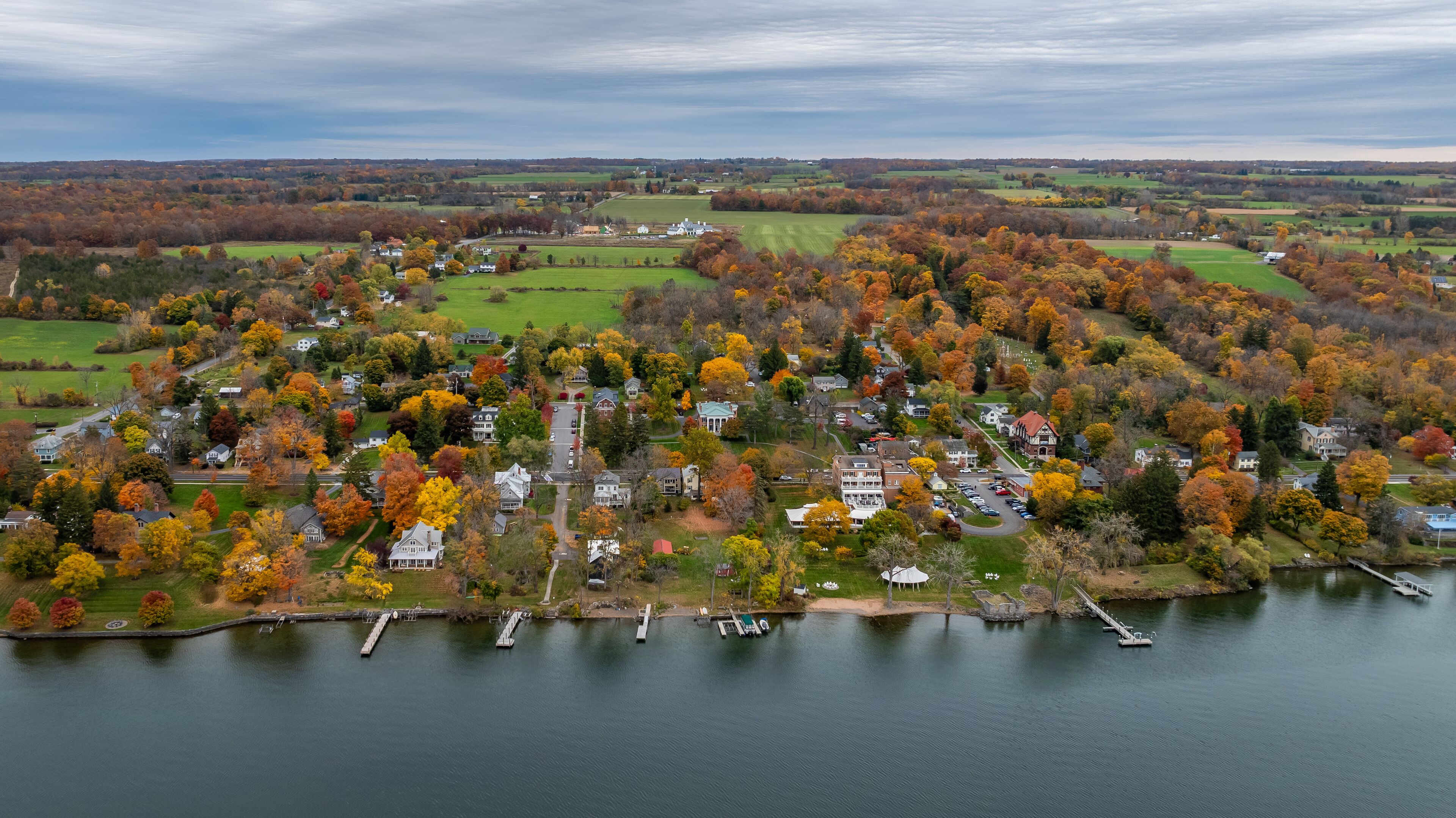 Aerial photo of the fall foliage surrounding the Village of Aurora, Cayuga County, New York State, October 2024.	