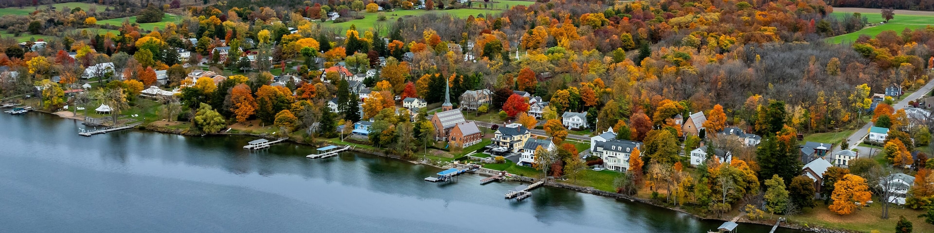 Aerial photo of the fall foliage surrounding the Village of Aurora, Cayuga County, New York State, October 2024.