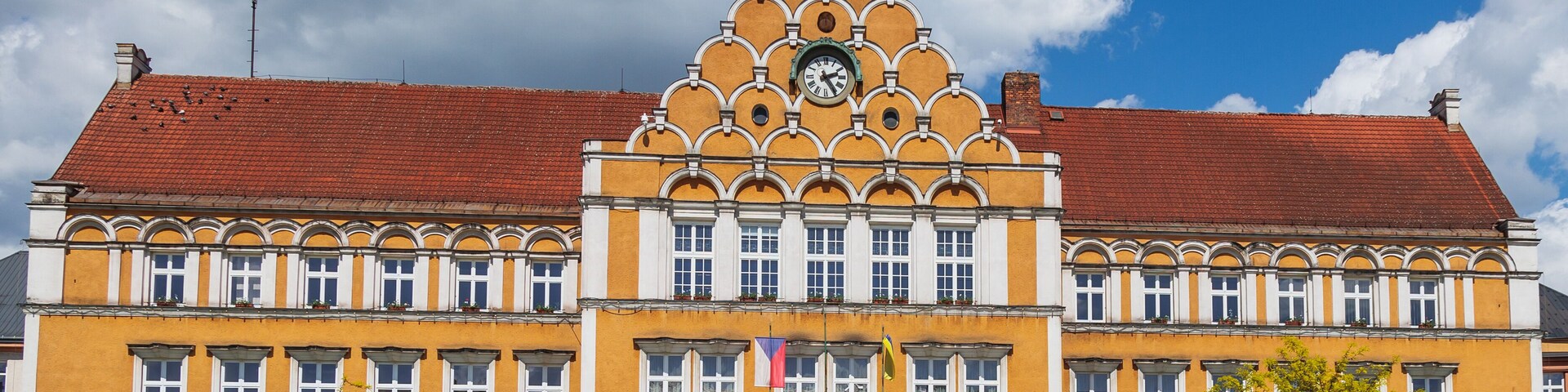 Town Hall and fountain on Square of Czechoslovak Army Square in Cesky Tesin town, Czech Republic
