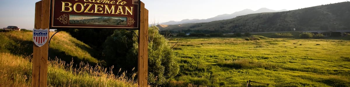 Bozeman which includes signage and tranquil scenes