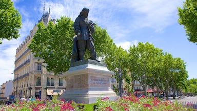 Béziers montrant parc, statue ou sculpture et mémorial