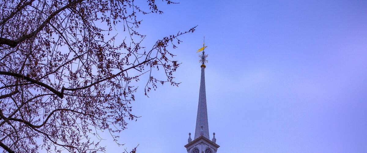 The First Church of Christ in Old Wethersfield, an American Colonial Era landmark red brick church built in 1635 with an architecturally distinctive white steeple, in Connecticut