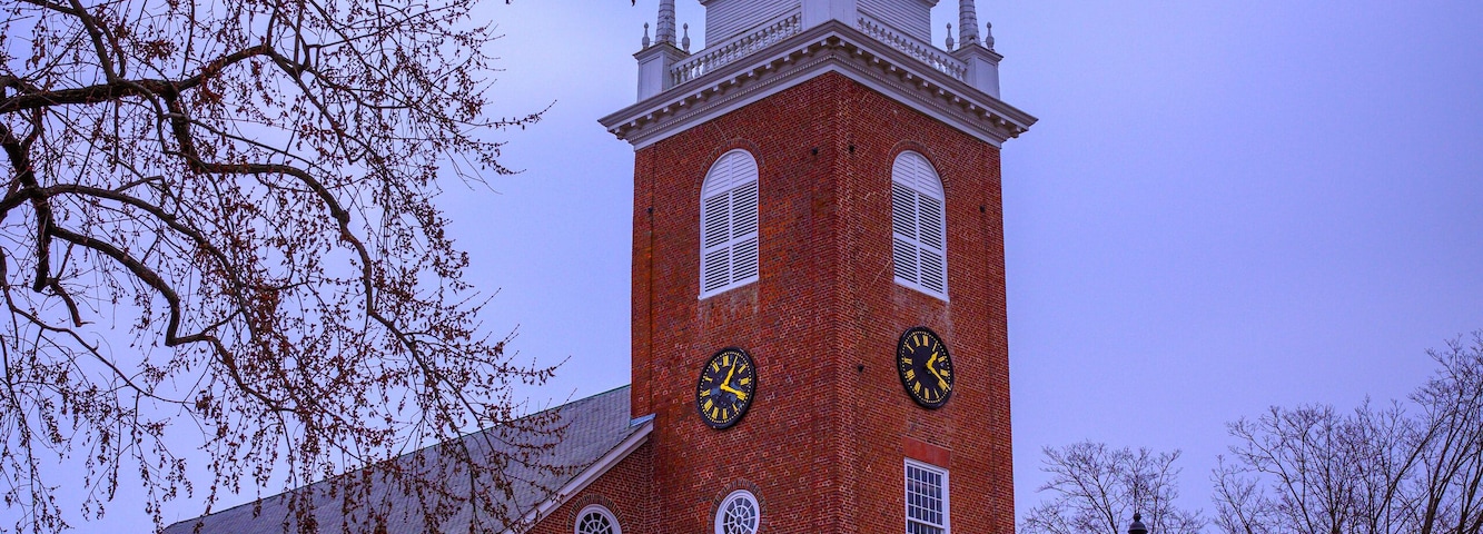 The First Church of Christ in Old Wethersfield, an American Colonial Era landmark red brick church built in 1635 with an architecturally distinctive white steeple, in Connecticut