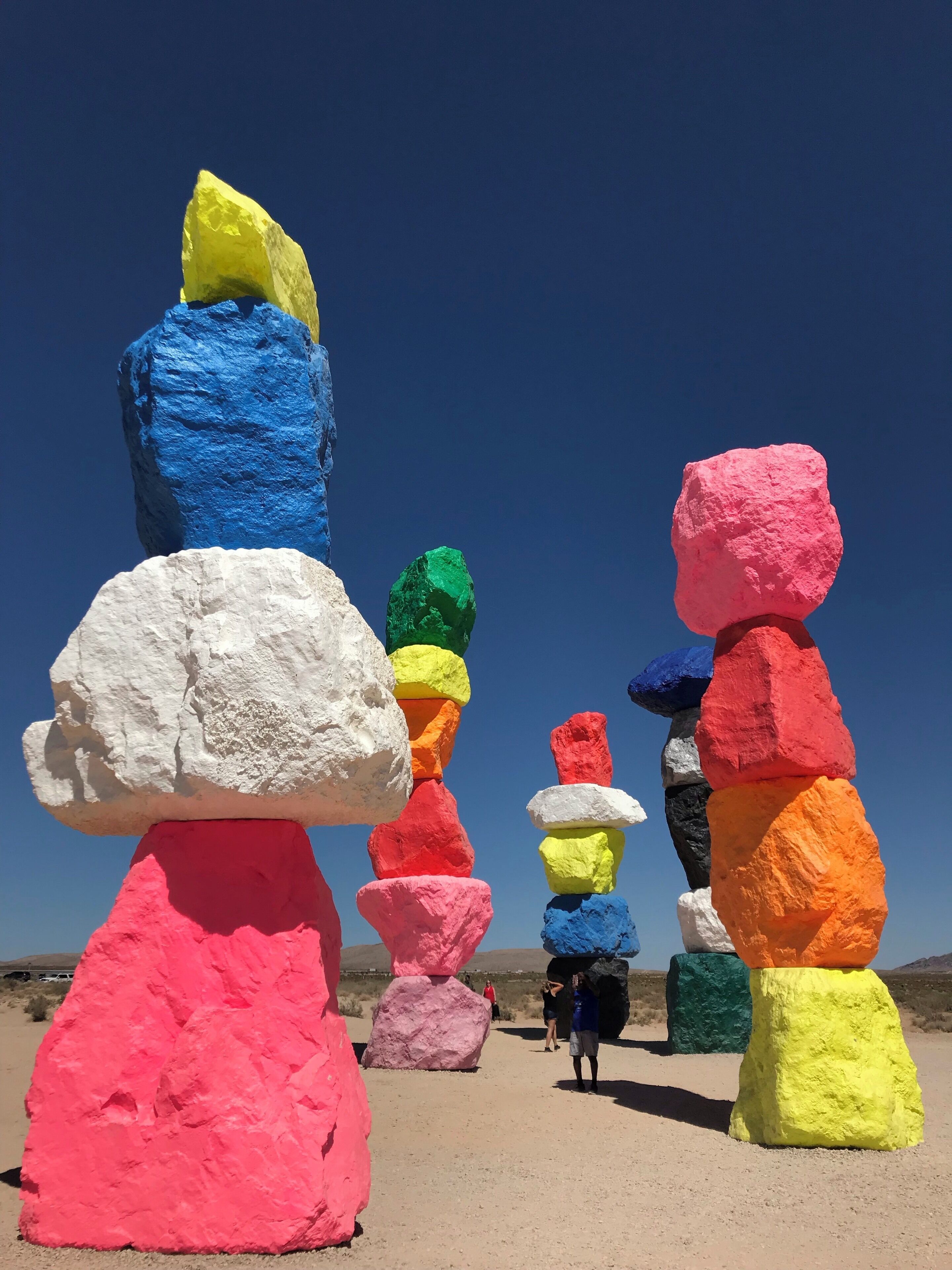 Colorful rock formations stacked in a line.