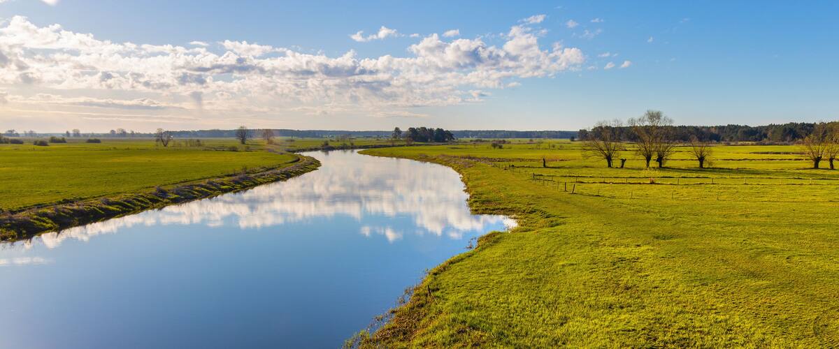 Early spring panoramic view of Narew river valley wetlands and nature reserve seen from Strekowa Gora village near Wizna in Podlaskie voivodship in Poland