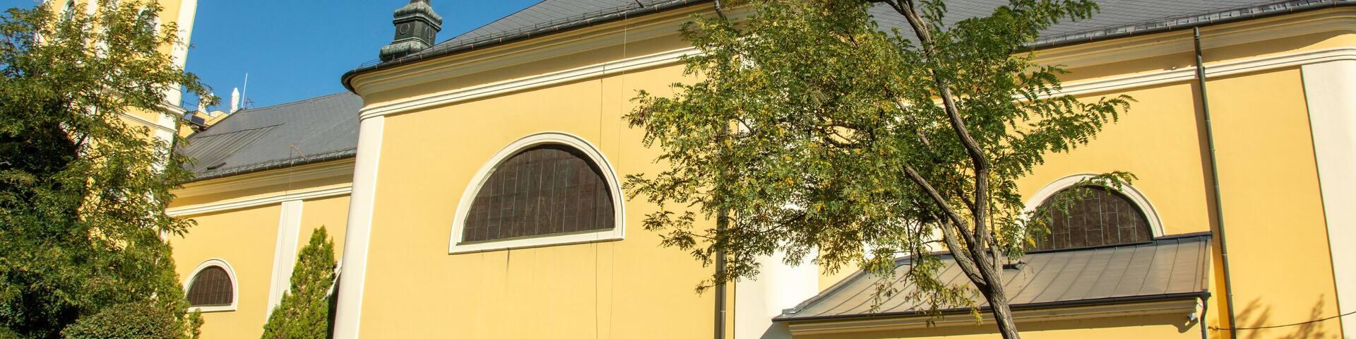 Yellow-washed building of the Roman Catholic Church of Our Lady in Jászapáti, Hungary