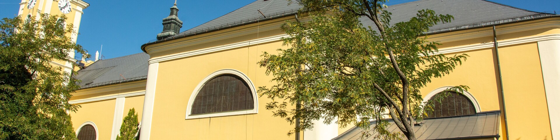 Yellow-washed building of the Roman Catholic Church of Our Lady in Jászapáti, Hungary