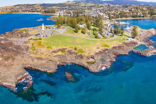 Panoramic aerial drone view at Kiama on the New South Wales South Coast, Australia showing Kiama Lighthouse on a sunny day