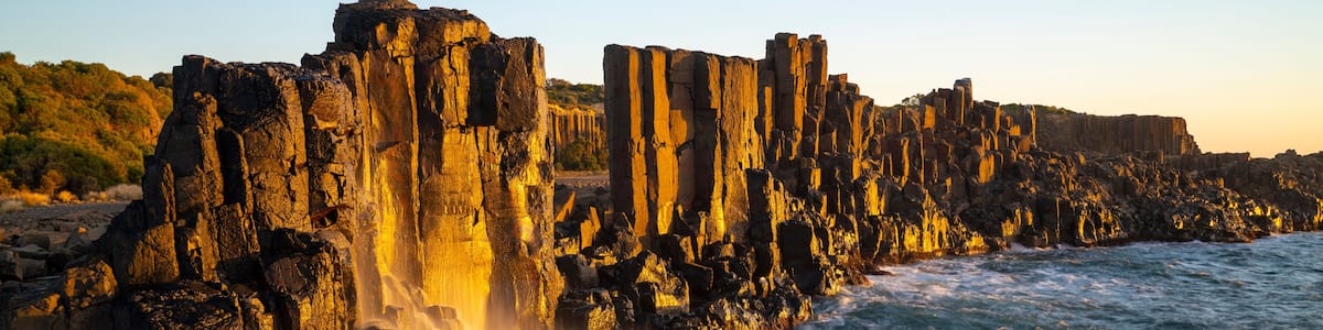 Wvaes of the Ocean crashing on to basalt rocks at Bombo Quarry