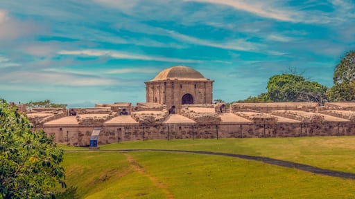 A historic stone fortress with a central dome and surrounding walls.