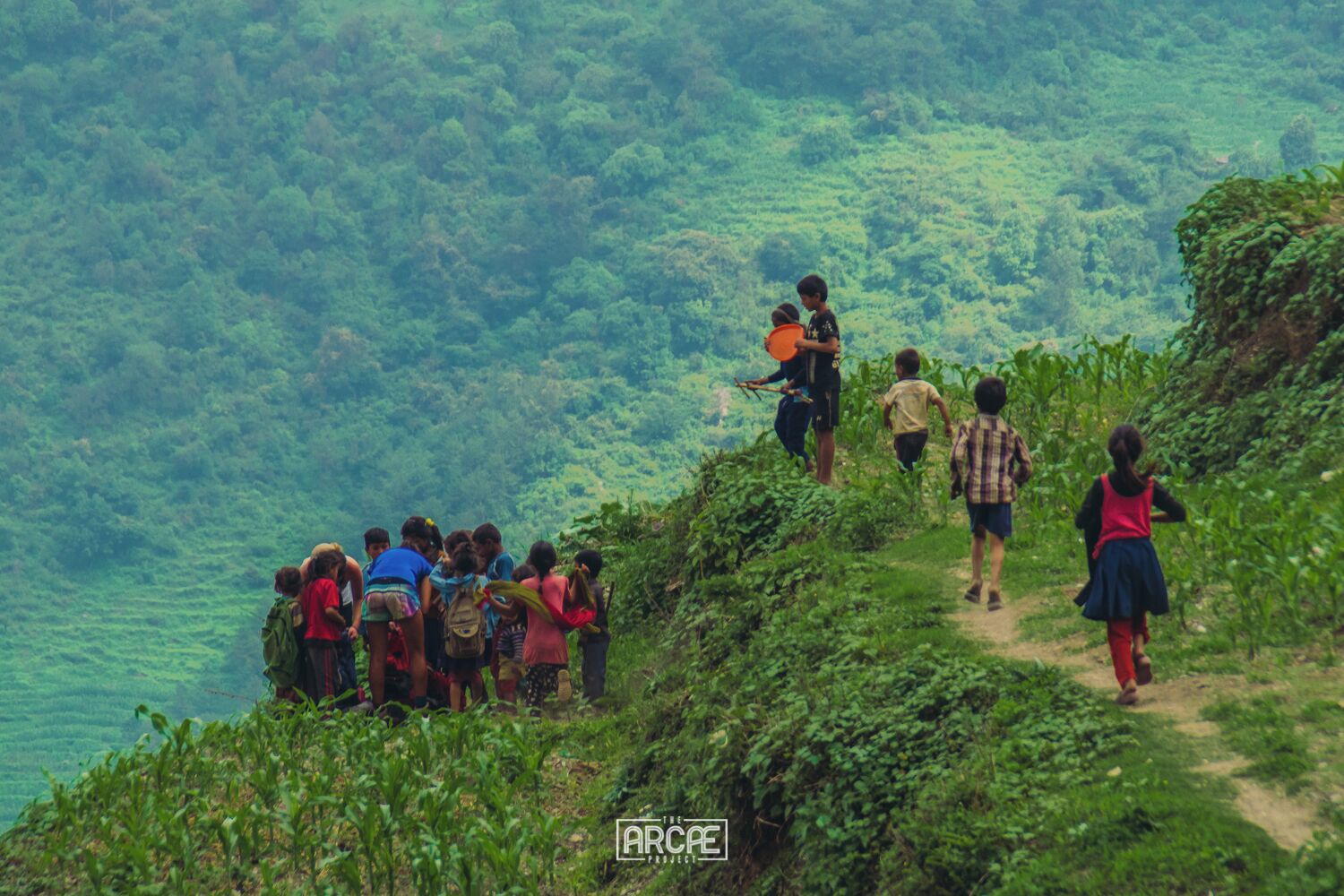 Walking into Muri as got to be one of the happiest moments of my life and I realized it just now. 

We had been walking for 6 hours when we crossed Mudi Bridge and started climbing the last 200 meters to the village, without refilling our wattle bottles, the sun staring down our necks and a steepness that let us breathless not even half way through. 

Amongst lines of 'namastés' and corn fields, we were welcomed by an army of little kids running toward us. Chocolates and photos—their main demands.

Prisoners of their laughs and excitement, we were left no option but to join their ranks and leave the nasty smell of tiredness behind. 

Blisters and mild-dehydration forgotten, we sat still for a while and succumbed to Muri's charm, on that afternoon when a group of weirdos arrived to town and failed to entertain their audience with bad magic tricks and silly music.