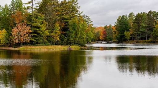 Waterfalls flowing into Lake of the Falls in Mercer, Wisconsin in September