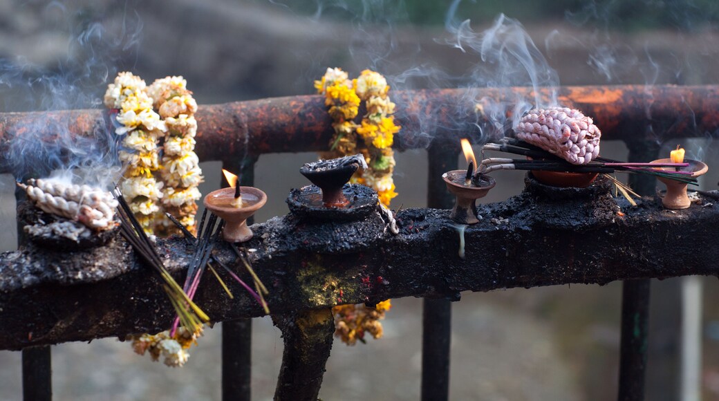 Offering candles and flowers in Dakshinkali Temple in Pharping, Nepal