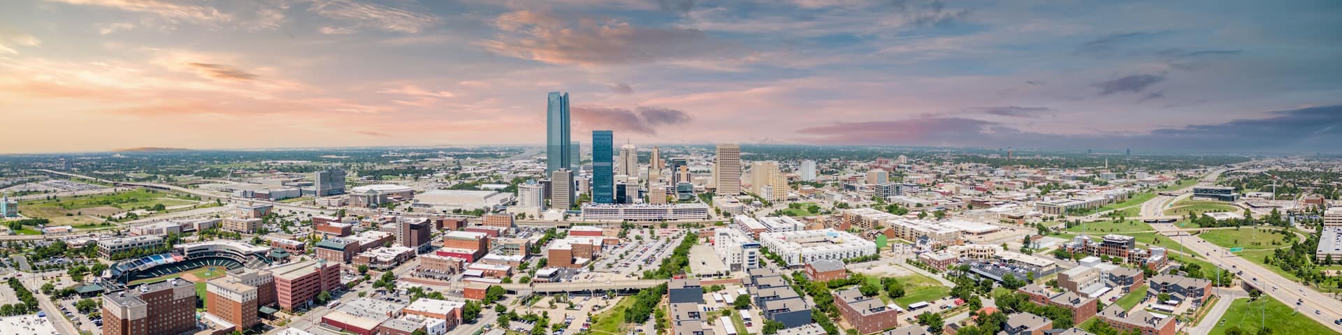 Aerial panorama Oklahoma City OK with dramatic sunset sky