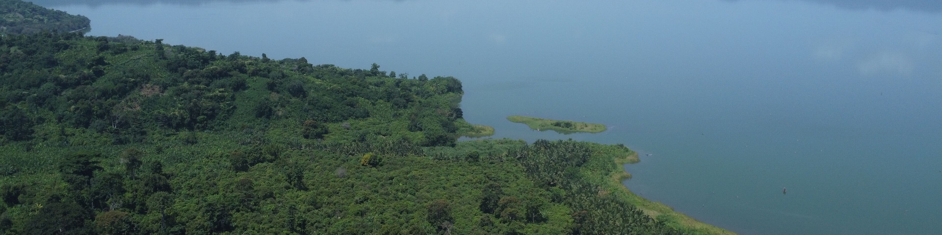 Scenic View of Lake Bosomtwe and Lush Vegetation in Ghana