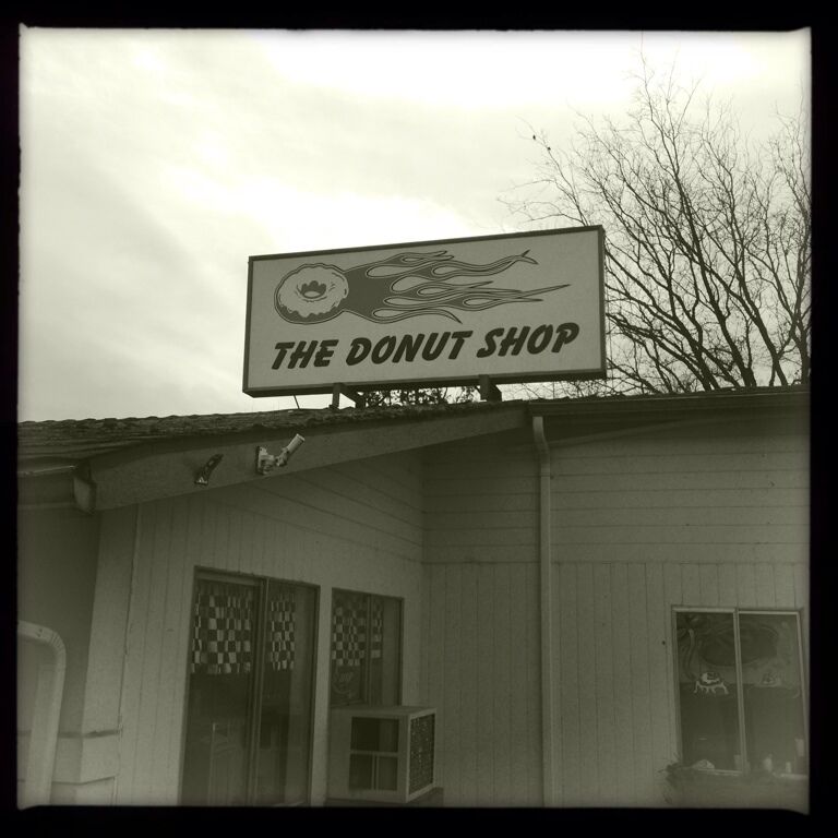 Strange back alley 50's style run down diner/donut shop