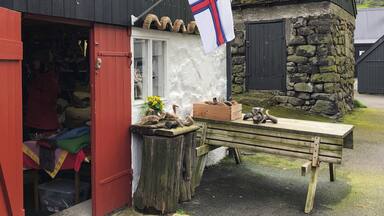 People who live in the small villages on the Faroe Islands are adapting to the increase in tourism. A woman turned part of her house into a small gift shop where local people can sell their crafts. The knitting is impressive. I got a great wool hat!