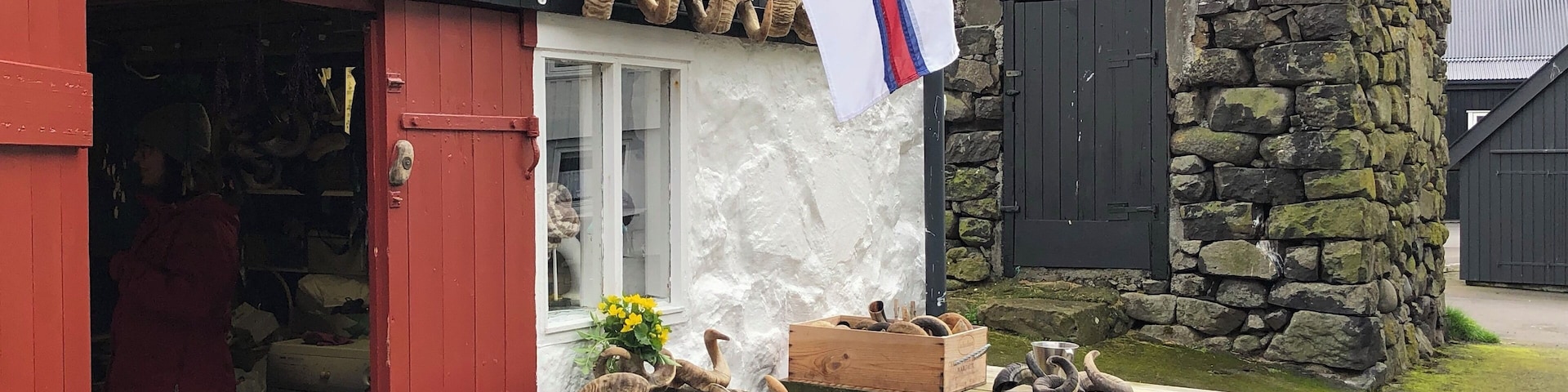 People who live in the small villages on the Faroe Islands are adapting to the increase in tourism. A woman turned part of her house into a small gift shop where local people can sell their crafts. The knitting is impressive. I got a great wool hat!