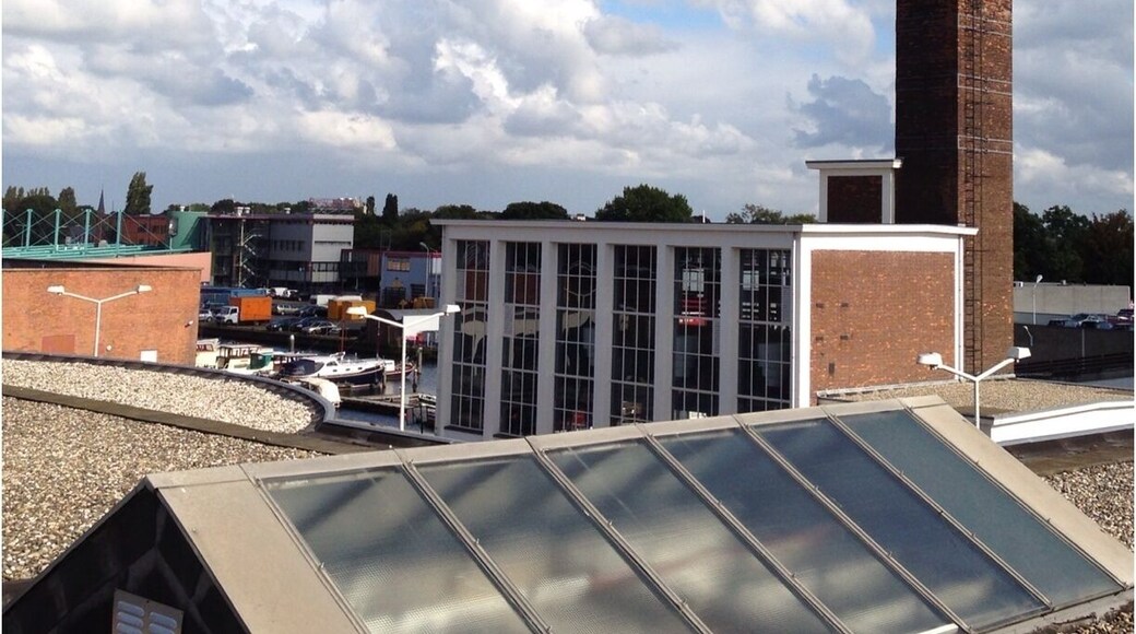 This former Cabellero cigarette factory now hosts many creative & startup companies, even has room for events. A much healthier use of urban space. http://www.cabfab.nl/